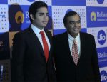 Mukesh ambani with his son