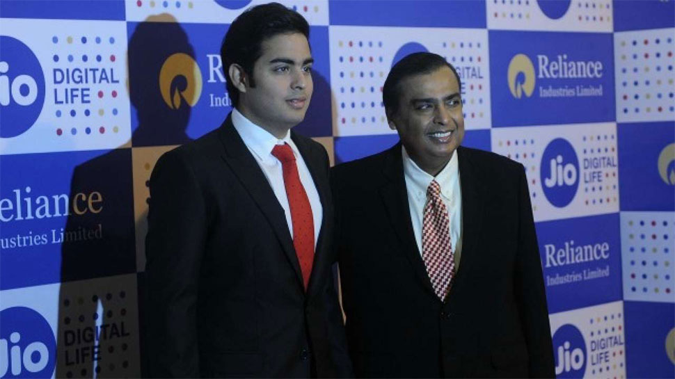 Mukesh ambani with his son