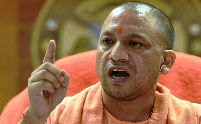 CM yogi adityanath says answered with guns